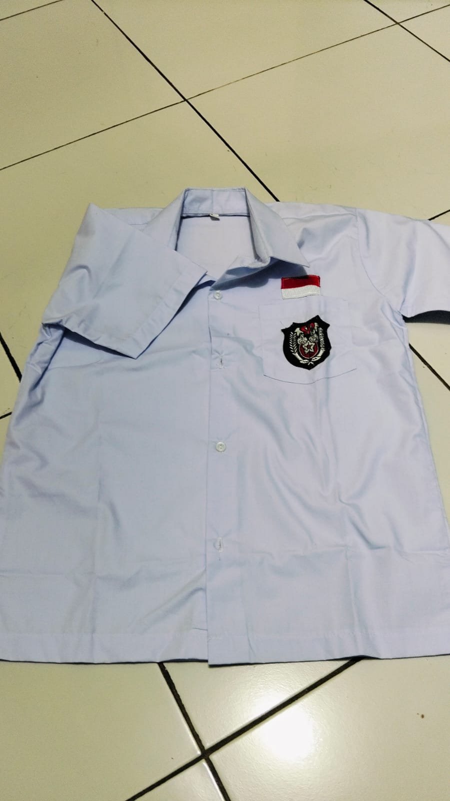 ATASAN MERAH PUTIH IKHWAN L (SD)